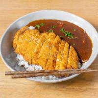 Chicken Katsu Curry · Chicken katsu, curry sauce, and steamed rice.