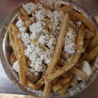 Greek French Fries with Feta and Oregano · Hand Cut French Fries Topped In Feta Cheese and Imported Oregano