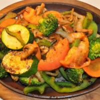 Fajitas Veggie Dinner · Grilled onions, bell pepper, tomatoes, broccoli, carrots, mushrooms and cauliflower. Served ...