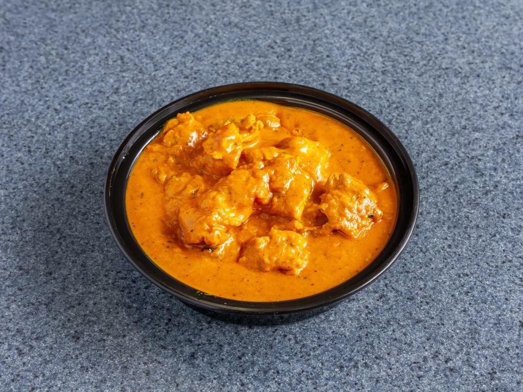 Chicken Korma · Chicken cooked in creamy almond and nut sauce.