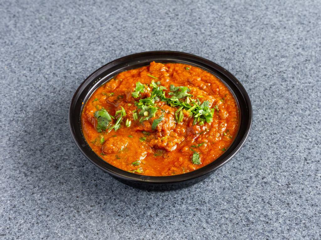 Lamb Curry · A chef special! Cooked in onion and tomato sauce.