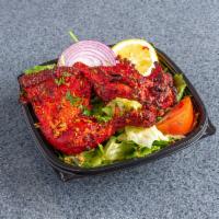 Tandoori Chicken · 1/2 chicken marinated in spices and grilled in clay pot.