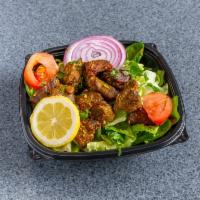 Lamb Kabob · A north Indian delicacy! Tender pieces of lamb marinated in yogurt, herbs and spices. Grille...