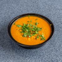 Dal Masala · Yellow lentil curry cooked with onion, tomato and spices.