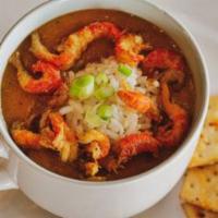 Crawfish Etouffee · Thick, butter roux with crawfish tails, sweet peppers and white rice.