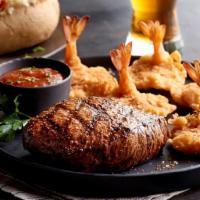 Gulf Coast Steak & Shrimp · Center-Cut Top Sirloin with grilled or fried shrimp. **Include choice of Fried Shirmp or Gri...