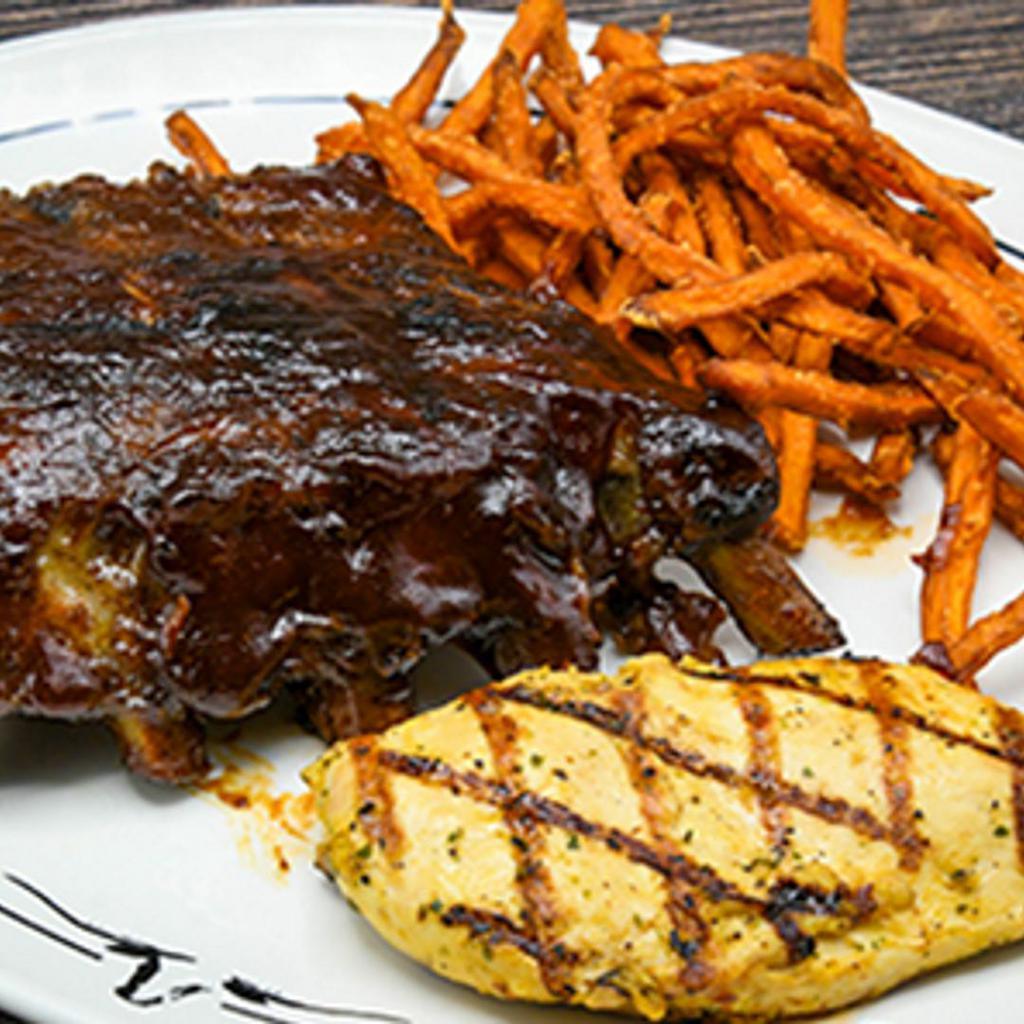 BBQ Baby Back Ribs & Grilled Chicken · “Fall-off-the-bone” ribs & marinated grilled chicken breast.