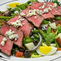 Steak Salad · Center-Cut Top Sirloin, crisp romain, red potatoes, eggs, green beans, black olives, onions,...