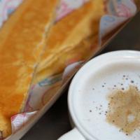 #1 Tostada y Cafe con Leche · Buttery cuban toast + Cafe con Leche