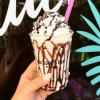Oreo Shake · Oreo pieces, topped with house made whipped cream, chocolate drizzle, Oreo cookie crumbs