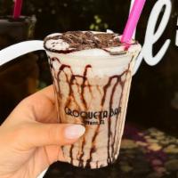 Vegan Oreo shake · Vegan ice cream made with coconut milk, Oreo crumbs*, chocolate syrup, topped with house mad...