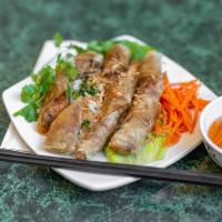Vietnamese Egg Rolls (3) · Crispy roll filled with pork, clear vermicelli, and vegetables. Served with lettuce, cucumbe...