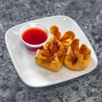 Crab Rangoon [6] · 6 piece Imitation crab meat, green onions and cream cheese flash fried in a wonton shell.  