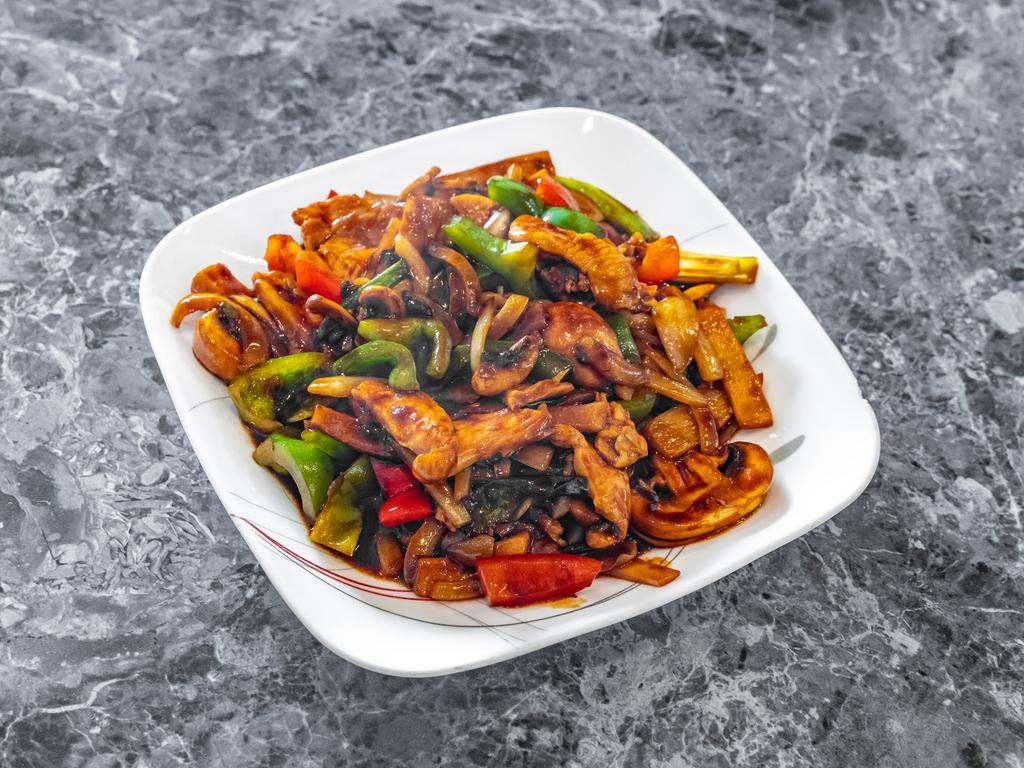 Pad Prik · Green peppers, onions, bamboo shoots and mushrooms stir-fried in a brown sauce. Gluten free.