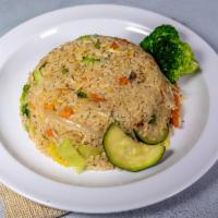 Hibachi Fried Rice · Eggs, peas and carrots. 