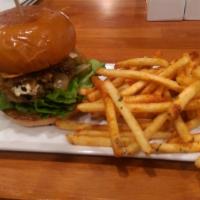 RK Burger · New York strip, caramelized onions and blue cheese on a brioche bun. Served with fries.