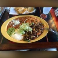 Steak Ranchero Plate · Strips of sirloin steak grilled with jalapenos, onions and tomato.