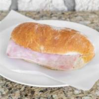 Regular Torta · Ham, beans, and mayonnaise in a cheese and jalapeno bolillo bread. Jamon, mayonesa, frijol e...