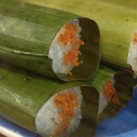 A3. Khao Neow Gai · Sticky rice stuffed with chicken and vegetables in banana leaf. 