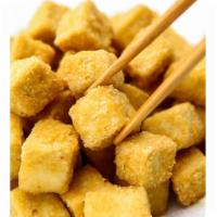 A4. Gold To Fu Tod · Crispy S level tofu with Thai sweet and sour sauce. 