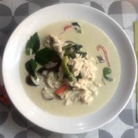 TC1. Gaeng Keo Wahn Curry · Famous green curry with eggplant, basil and coconut milk. Hot and spicy. 