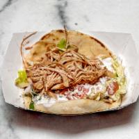 Southwest Chicken Taco · 1 TACO Spicy pulled chicken, pineapple pico, shredded napa, mexican crema, cotija cheese. (d...