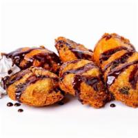 *Fried Oreo* · Topped with Hershey’s syrup & powdered sugar