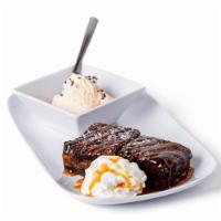 *Triple Threat Brownie* · Our warm signature triple-layered brownie (chocolate chip, Oreo, and chocolate brownie) topp...