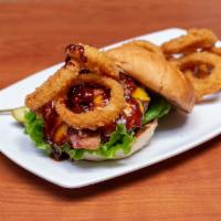 Wild West Burger · Apple-wood smoked bacon, onion rings, BBQ sauce, Cheddar cheese, lettuce, tomato and mayo. H...