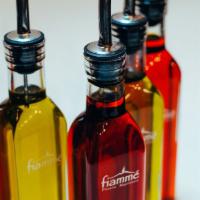 Fiamme Chili Oil · Our Homemade Chili Oil starts off as our Herbaceous Oil, then with a blend of Red pepper chi...