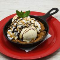 Chocolate Chip Cookie Sundae · Vanilla Ice Cream, Chocolate and Caramel Sauce, Peanuts, Whipped Cream.