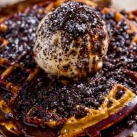 Waffle and Vanilla Ice Cream · Buttermilk waffle with a scoop vanilla ice cream, drizzle of oreo cookie, with caramel and c...