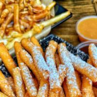 Funel Cake Fries · Funnel cake fries, topped with powder sugar and choice of caramel or chocolate dipping