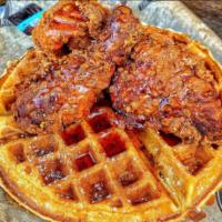 Fried Chicken & Waffle  · 3 pieces of fried chicken on the top of a Buttermilk waffle with sugar pearls and side of bu...