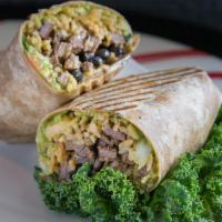 5. Chipotle Steak Burrito · Grass-fed steak, guacamole, black beans, brown rice and chipotle sauce. Served in whole whea...