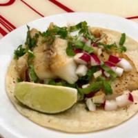 18. Fish Taco · Served with fresh cilantro, onion, lime and radish. 