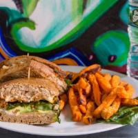 27. Grande Turkey Chorizo Torta · Pressed Mexican sandwich served on a whole wheat with pepper jack, avocado, pickled jalapeno...