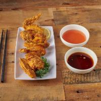 A7. Fried Chicken Wings with Garlic Sauce · 4 pieces. Hot and spicy.