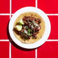 Street Taco · Carne asada, shredded pork, al pastor, chicken, chorizo, or ground beef with cilantro and on...