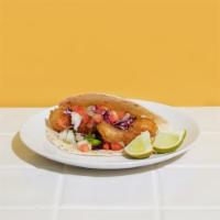 Avocado Taco · Fresh avocado in tempura hand battered to ordered and fried. Purple cabbage, pico, fresco ch...