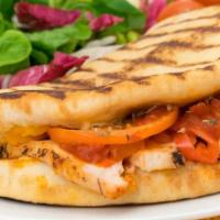 Chicken and Mozzarella Panini · Grill chicken breasts brushed with olive oil, rosemary, and garlic powder. Add sliced tomato...