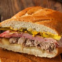 Cubano Sandwich · Ham, pork Swiss, pickle, mustard.
