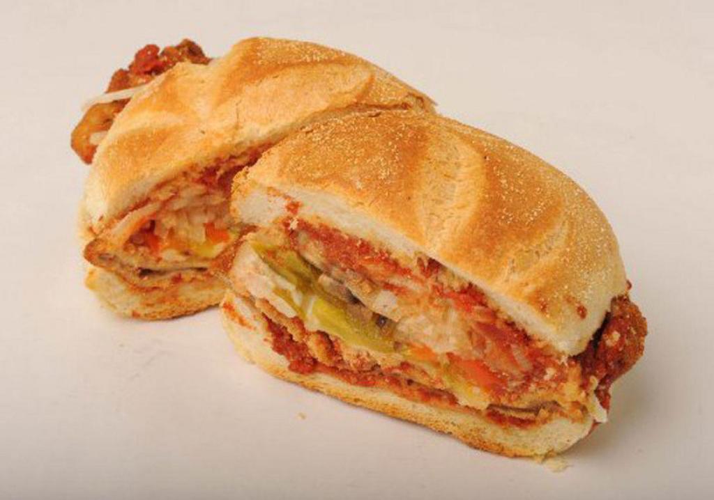 Godfather Sandwich on Hero · Sliced steak, sauteed onion, red-green pepper, marinara sauce, Parmesan mozzarellas cheese.
