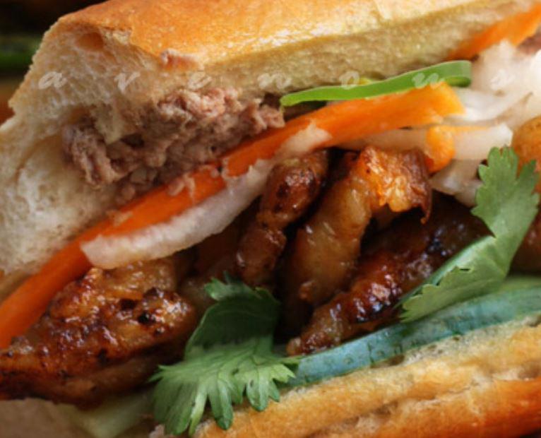 Spicy Pork Banh Mi Sandwich · A Vietnamese sandwich served on a baguette. 