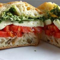 Caprese Sandwich · Mozzarella, tomato, basil olive oil. basil pesto.
