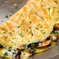 Spinach-Mushroom Omelette · Sauteed baby spinach and mushroom.