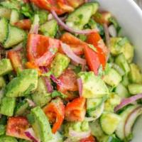 Avocado Salad · Garden salad mix, red onion, green, red pepper, tomatoes, carrot, cucumber, and avocado. Add...