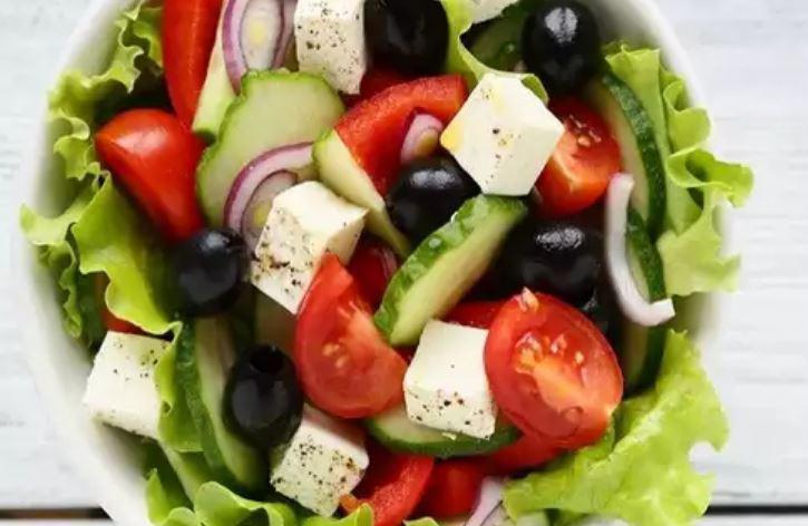 Greek Salad · Romaine, olive, carrot, cucumber, mixed pepper, red cabbage, tomatoes and feta. Add protein and cheese for an additional charge.