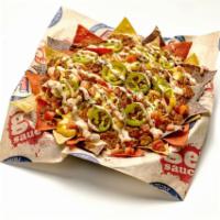 Impossible Chili Nachos · Non-GMO tortilla chips layered with ImpossibleTM Chili, Fat Tire® beer cheese & cheddar/ moz...