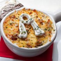 Baked Potato Soup · Oven-baked potato, cream, applewood smoked bacon, cheese, sour cream, non-GMO crackers.